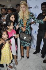 Paris Hilton unveils her line at Shoppers Stop in Juhu, Mumbai on 25th Sept 2011 (25).JPG